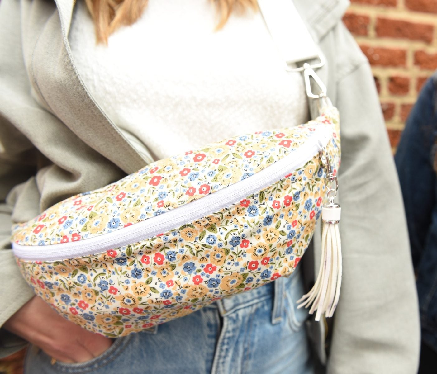 Close-up of a floral side of a handmade reversible Switch Purse sling bag