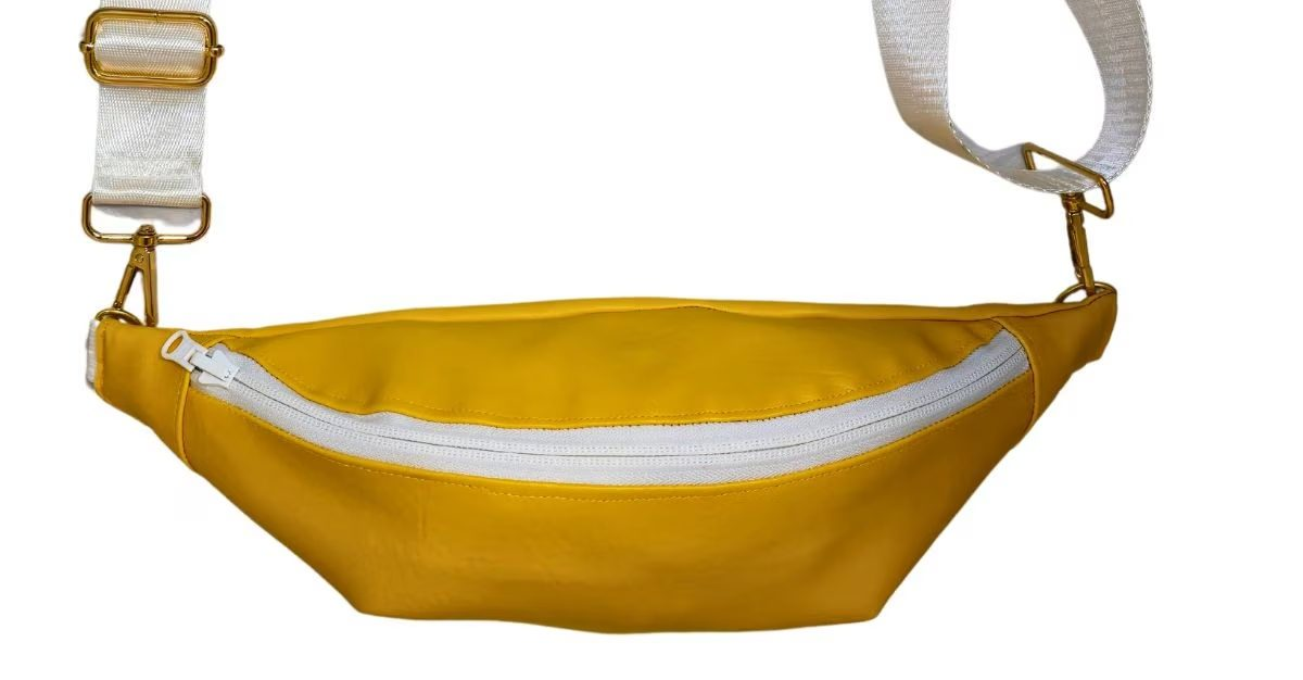 Solid yellow reverse side of a Salisbury-themed handmade reversible Switch Purse crossbody bag