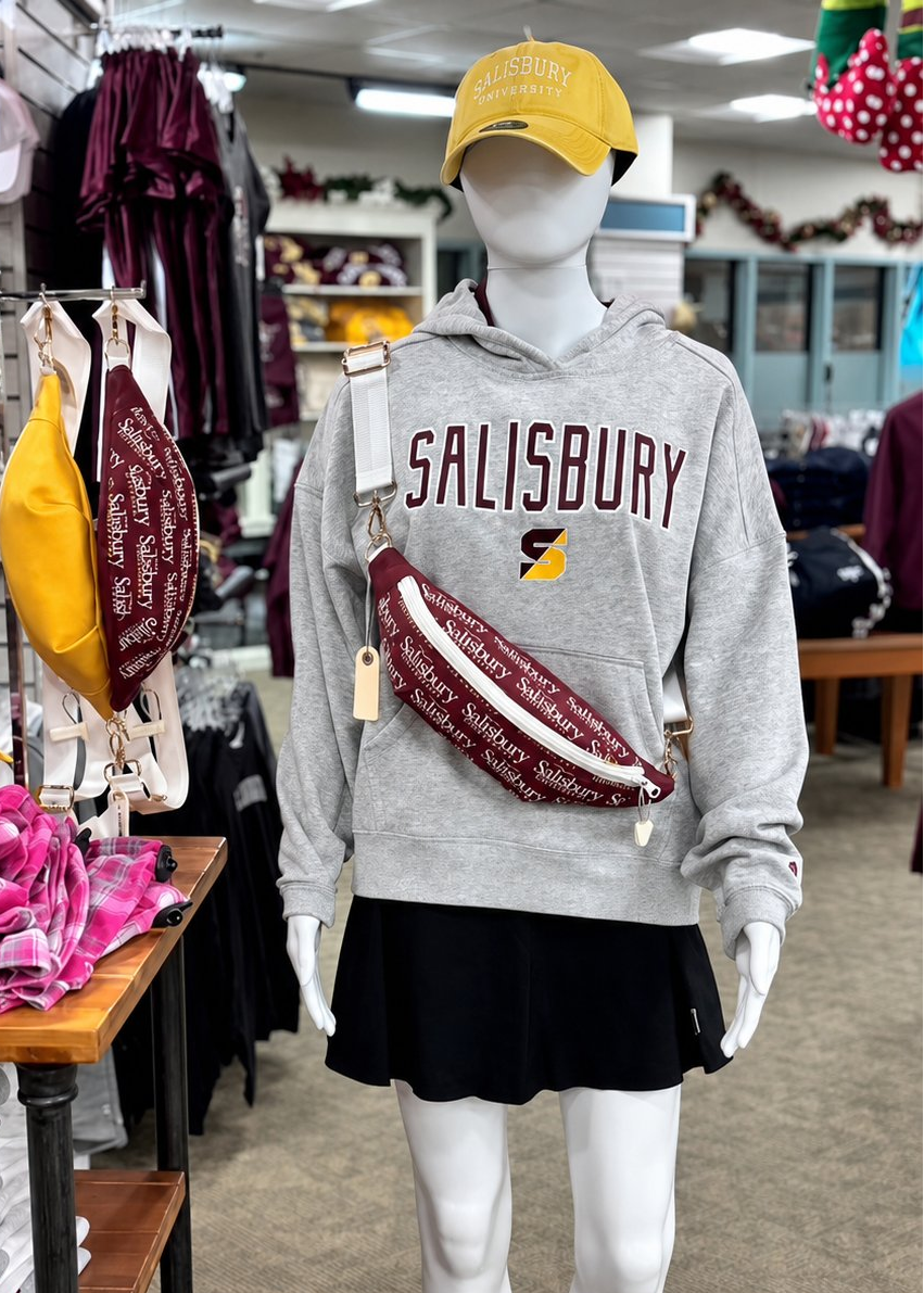Salisbury-themed store display with reversible Switch Purse sling bag